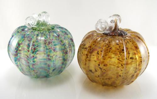 Blown glass pumpkin. Multi-color mixed patterning throughout. Approx. 6" x 6"
Cool Mix (purple/Blue/Green) 
Warm Mix (Amber/Purple/Yellow)