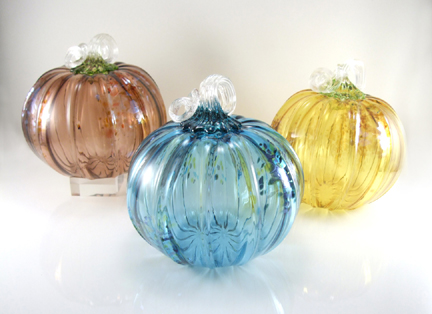 Transparent solid colored pumpkins with mixed color and metallic accent marks. Approx. 6" x 6"