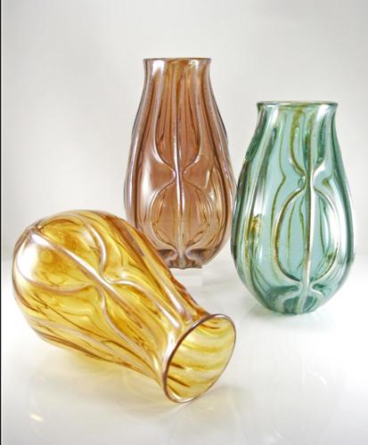 Large scale vase, pairs beautifully with Tulip flowers or other tall top-heavy blooms. Transparent or opaque base color, with lusters on textured pattern. Approx. 9-10"H x 4-5"W