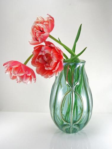 Large scale vase, pairs beautifully with Tulip flowers or other tall top-heavy blooms. Transparent or opaque base color, with lusters on textured pattern. Approx. 9-10"H x 4-5"W