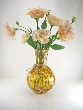 Blown glass flower vase. Available in many color options. Approx. 7-9" h x 5-6" w 