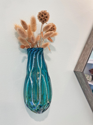Wall Vase. Hangs on a nail. Available in many color options. Fill with fresh or dried flowers, root house plants or use as a scented oil diffuser. Approx. 5-7" L x 3" W x 2" D