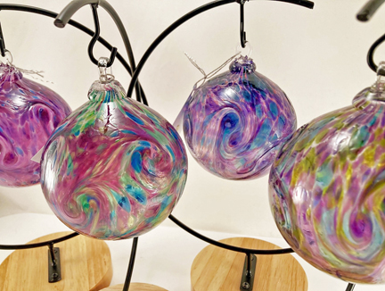 Multi-color transparent ornaments, beautiful in a bright sunny window! Colors vary. Approx. 3"w x 4"h